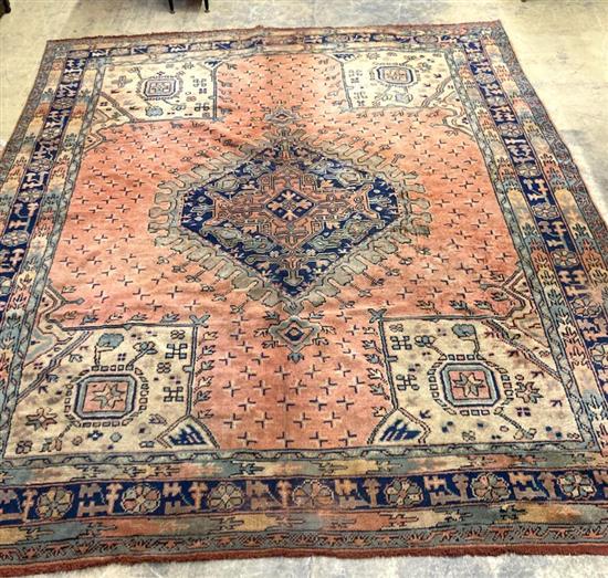 A Turkish hall carpet, 311 x 275cm